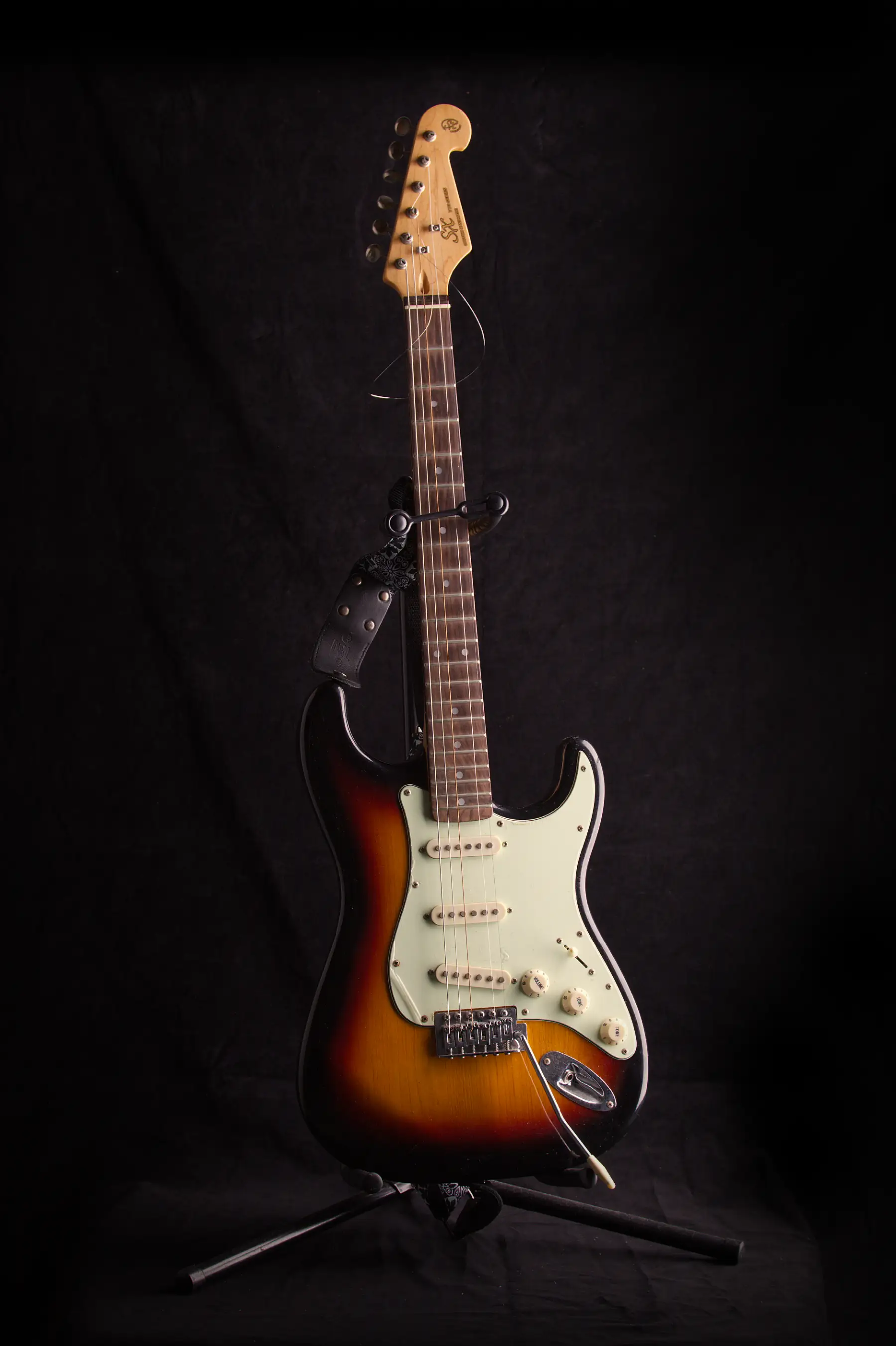 Sunburst Fender Stratocaster on black